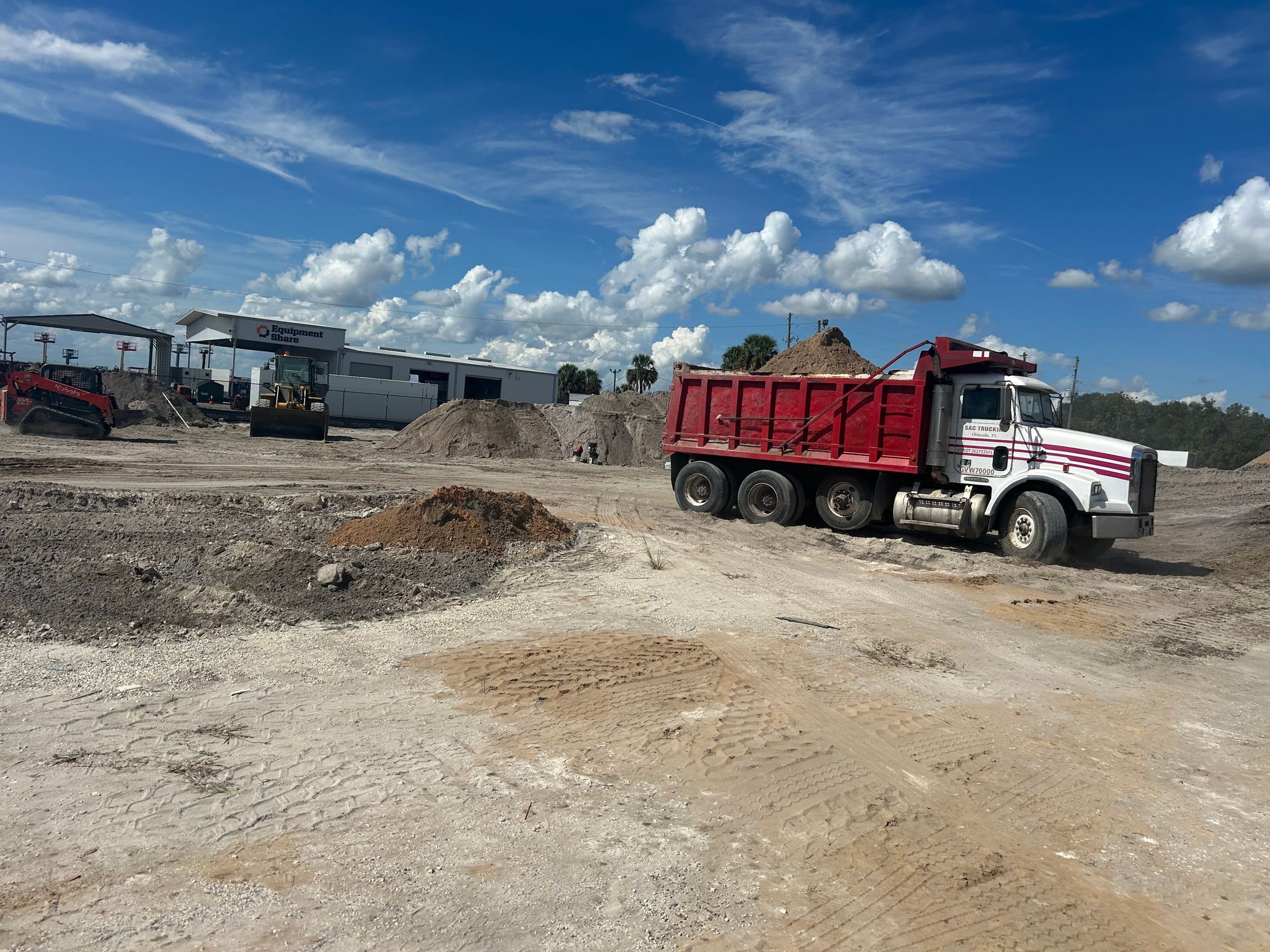 Dump truck and earthmoving operations at Hermit Smith Industrial
